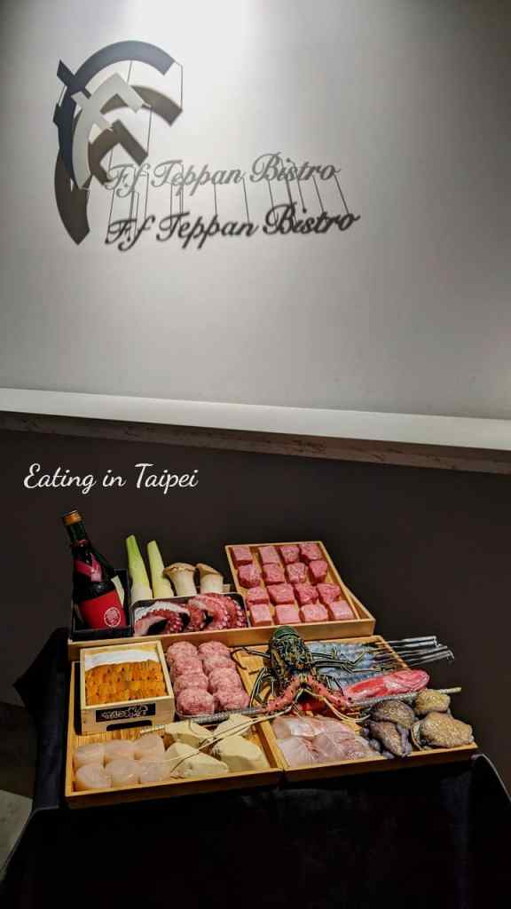 F. f Teppanyaki present their food options on a wooden board for you as you walk in. Here we can see all of the food offerings all in one space!